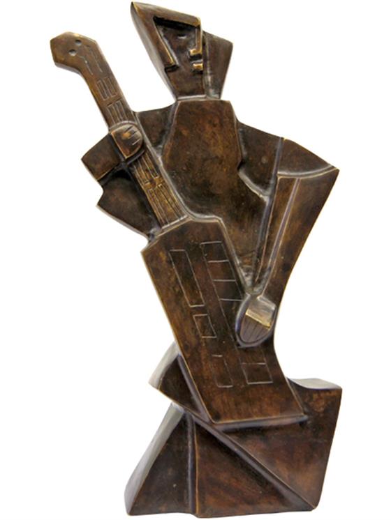 Kubistická socha kytaristy