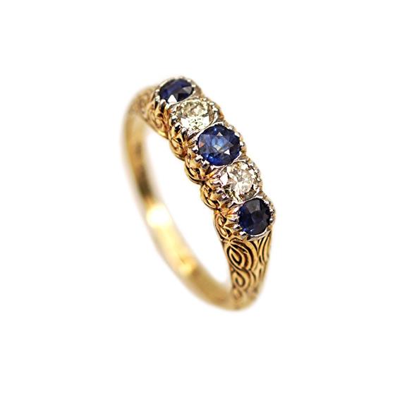 Zlatý prsten s brilianty a safíry